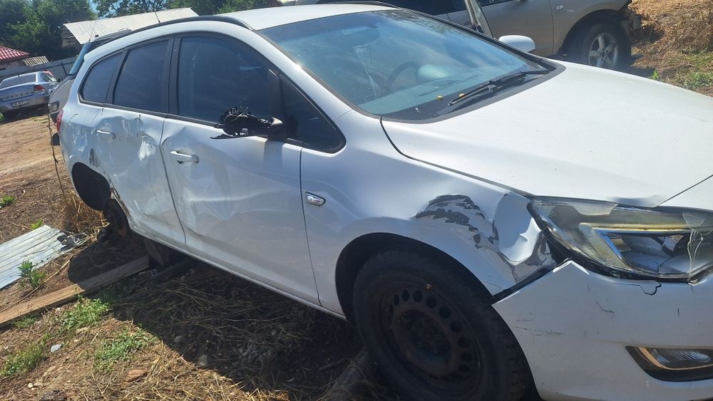 Capota tragar far opel astra j break 1.6 benzina gpl carlig remorca usa  motor cutie caseta directie