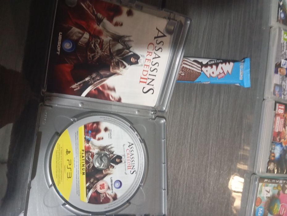 Игра за ps3 Assassin's creed 2 platinum