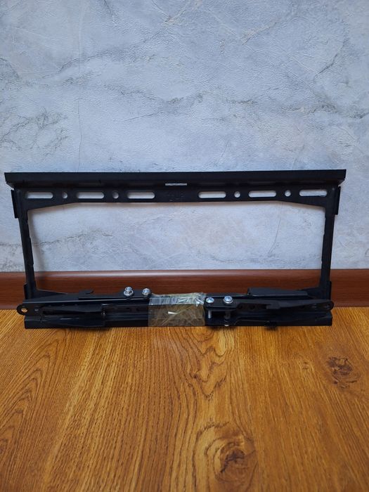 Продам кронштейн