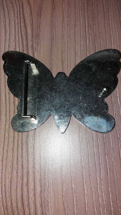 тока за колан пеперудата