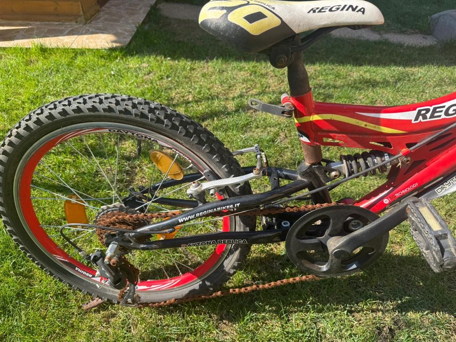 Vând bicicleta cu suspensie cu roti pe 20