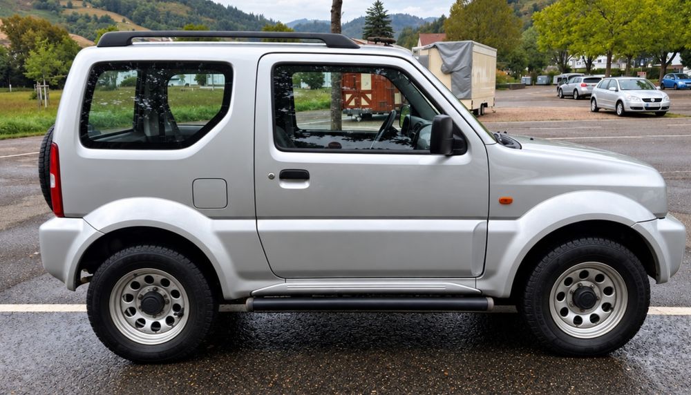 Suzuki JIMNY .1.3  benzina , REDUCTOR, AER CONDITIONAT rate, garantie, livrare la domiciliul clientului