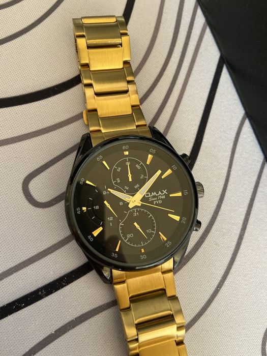 Часы  omax в прекрасном состоянии.