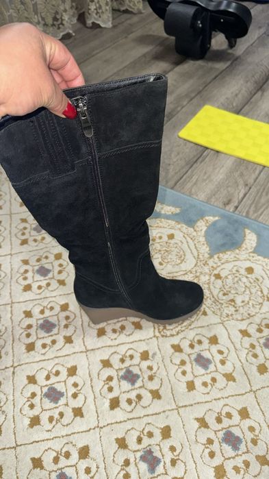 Продам новые сапоги