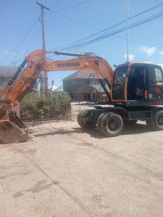 Экскаватор колесный хюндай