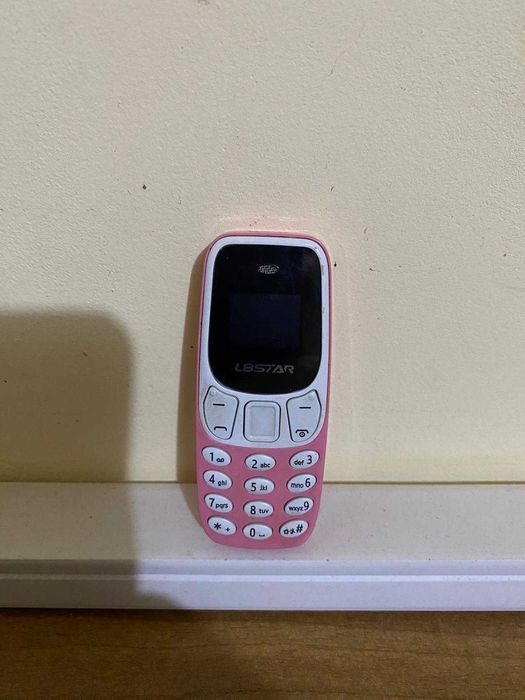 Мини детски телефон – розов, работещ, със SIM – идеален за деца