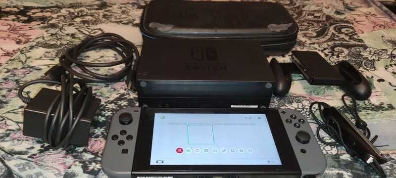 Nintendo Switch cu toate accesoriile originale + husa Zelda