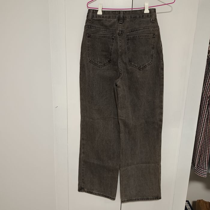 Blugi largi de culoare gri sters