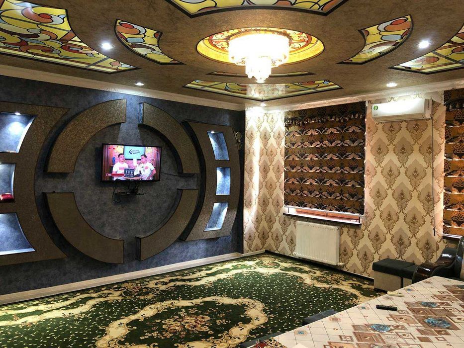 Фергана центр. Экстренная больница олдида Янги курилган Дом.