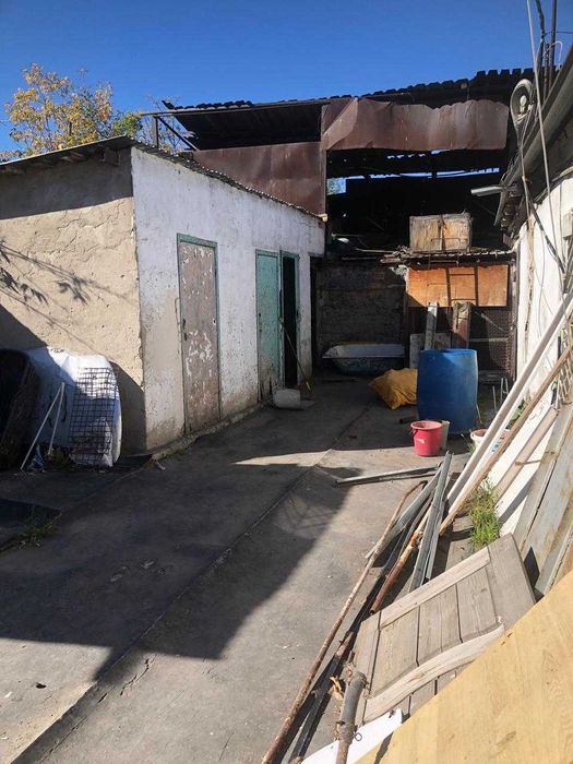 Продам дом в городе с магазином по ул. Карла Маркса