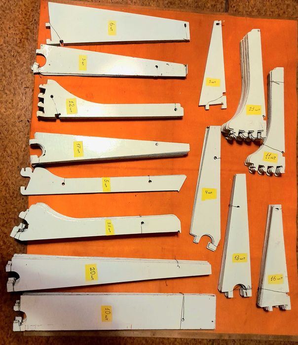 Кронштейны заводские, для стеллажей и полок, новые. Кол-во - 150 шт.