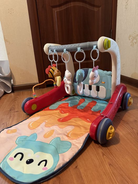 Музыкальный коврик и толокар