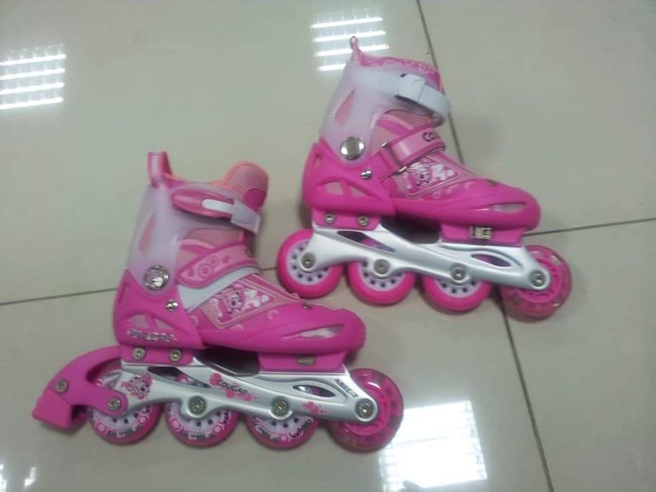 Роликовые коньки