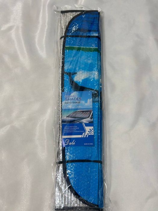 Шторка солнцезащитная на лобовое стекло.