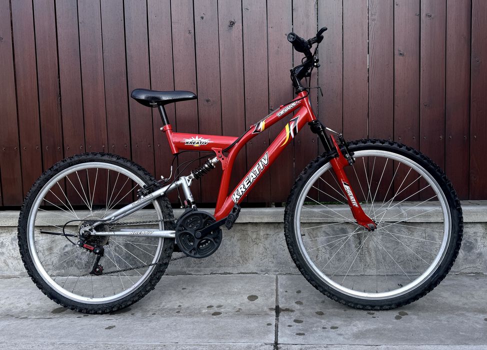 Bicicletă copii MTB Kreativ Dinamik 24", 18 viteze, dublă suspensie – stare bună