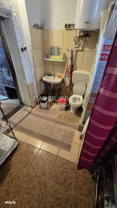 Casa 4 camere,baie +2 bucatarii| pivnita si garaj, Teren 1244 mp