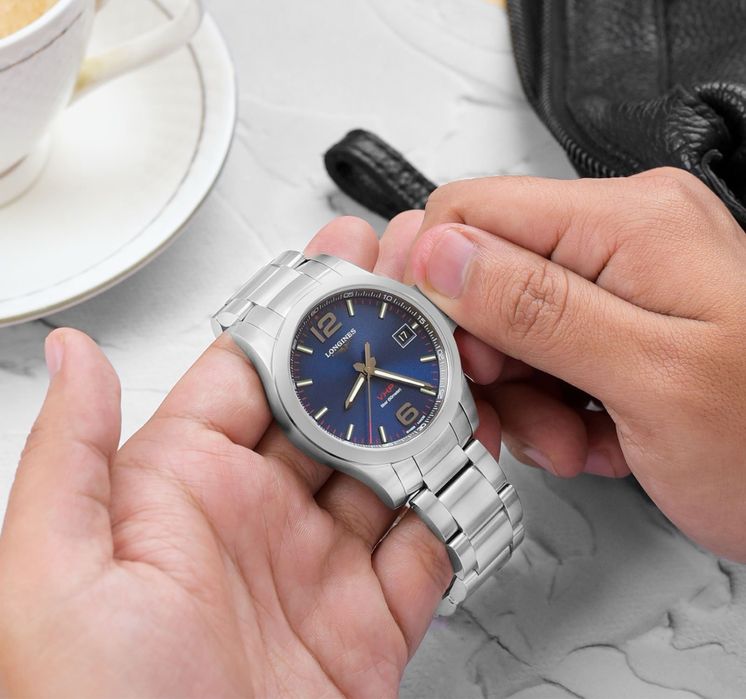 Швейцарские часы фирмы Longines Conquest V.H.P., кварц