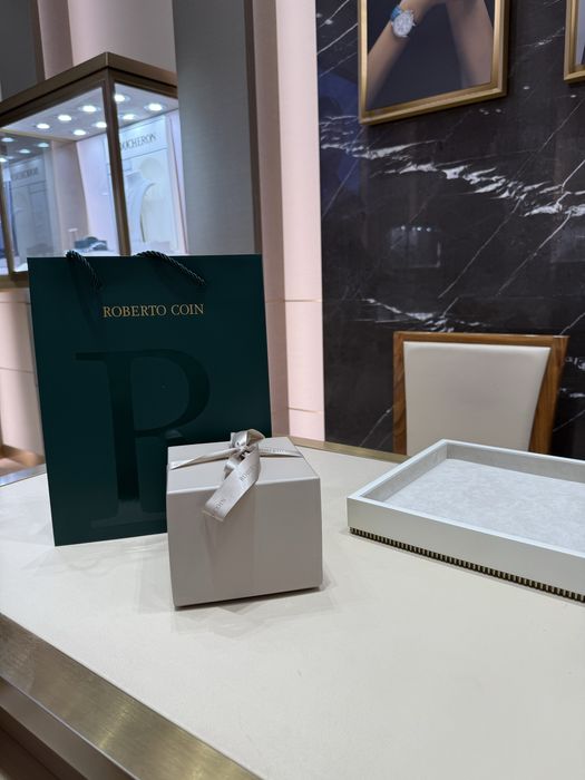 Продам серьги Roberto Coin.