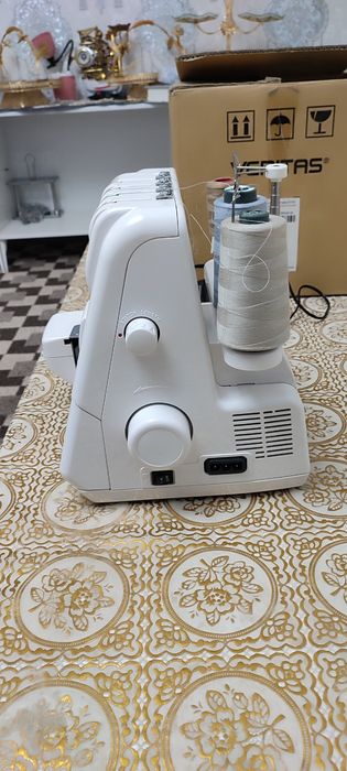 Yangı tikish moshinasi avirlok