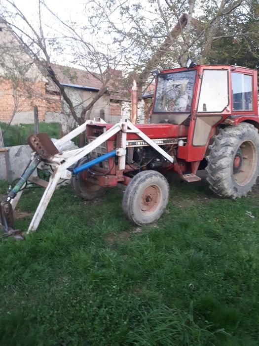 Încărcător pentru International 844 piese