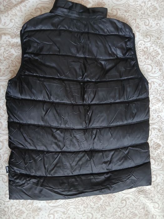 Продам жилеты новый
