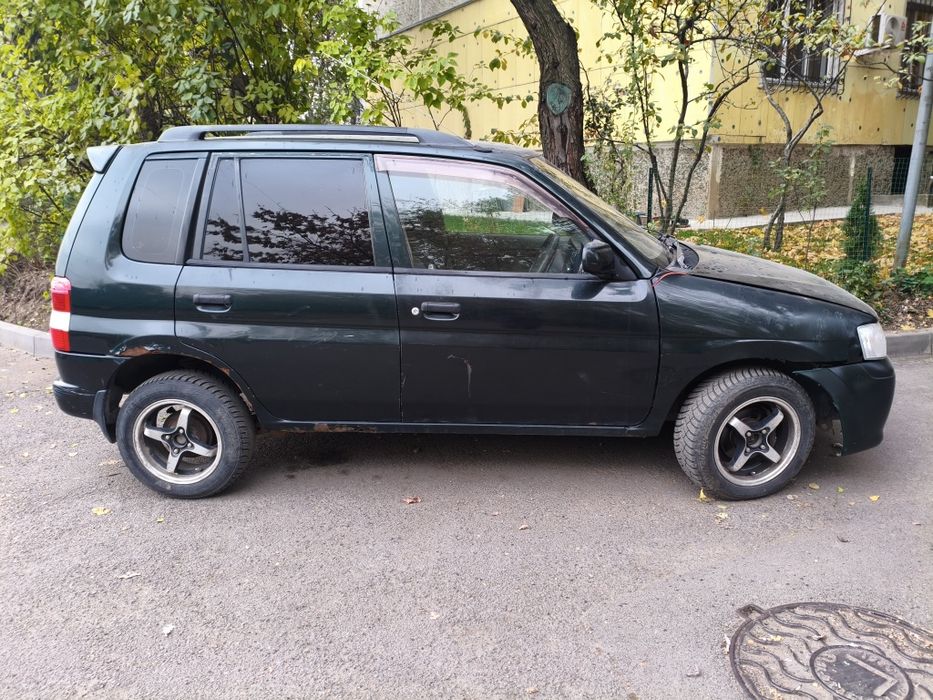 Продам автомобиль Mazda Demio.