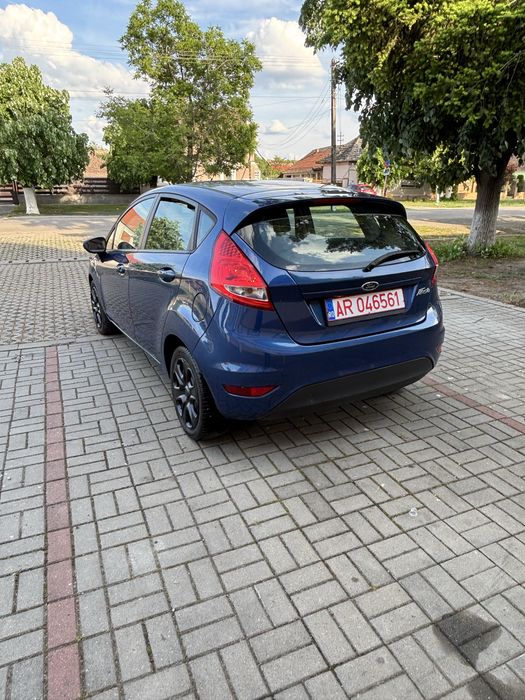 Ford Fiesta Titanium 2010 1.3 benzină, motor clasic fară turbo Euro 5, are numere roșii valabile, ofer fiscal rapid la vânzare.