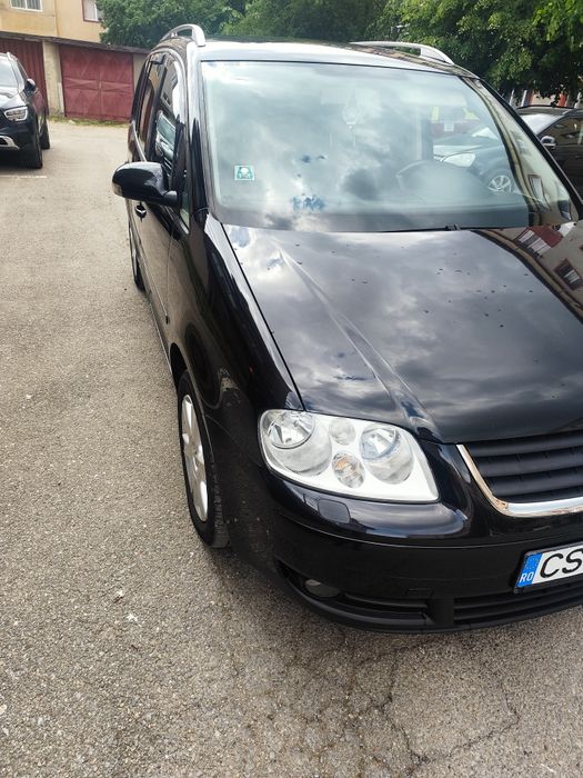 Volkswagen Touran 2.0 diesel, 5 locuri