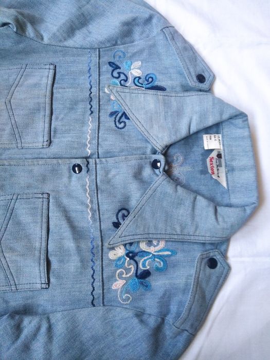 Две новые куртки с набивным рисунком за 60000 обе. Размер 46--48