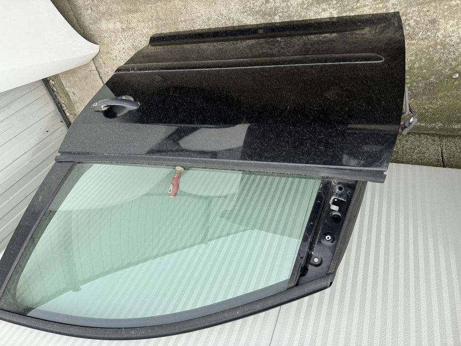 Usi , portiere touran