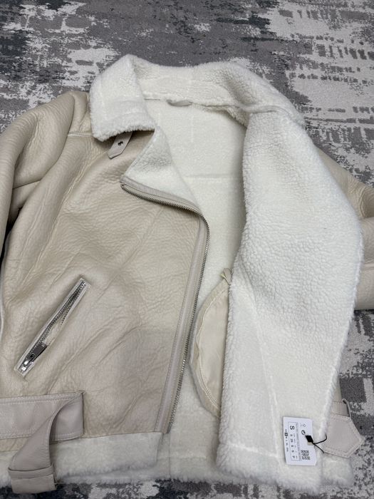 Продам дубленку белого цвета