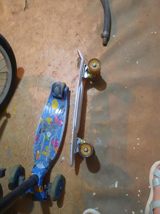 Самокат и скейт .