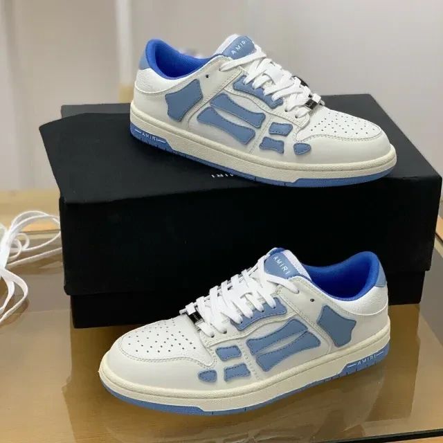 Amiri Skel Top Low Sneakers "White/Light Blue"