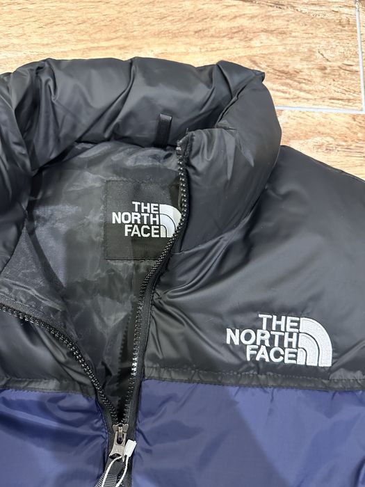 The North Face жилетка пух