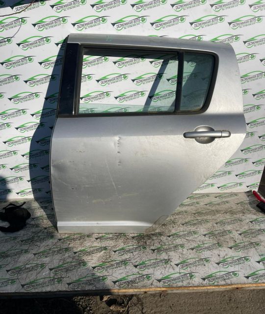 Usa / Portiera spate stanga Defect minor Suzuki Swift a 3-a generatie