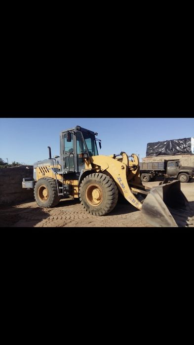 Погрузчик фронтальный