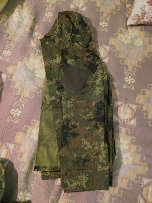 Камуфлажна шуба.