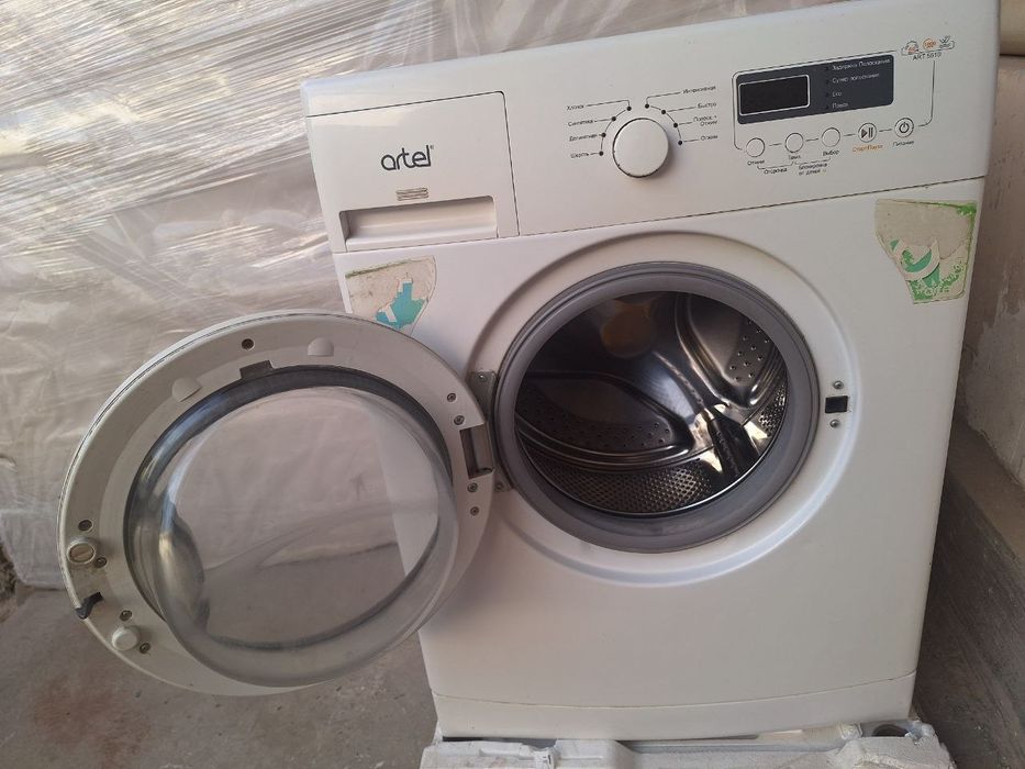 Стиральная машинка Артел.