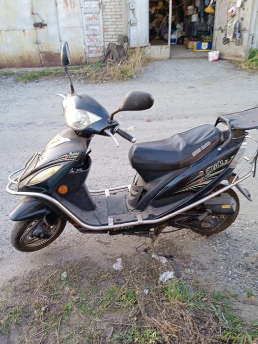 Скутер Рэйсер на ходу