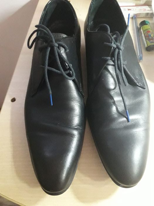Vand pantofi barbatesti de piele