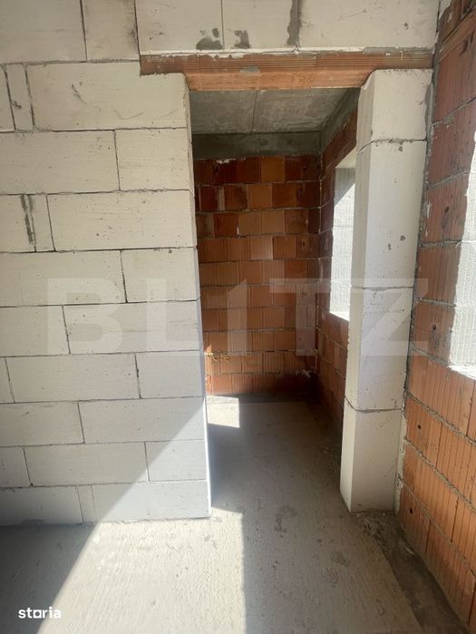 Apartament cu 3 camere, dispus pe doua niveluri, cu gradina