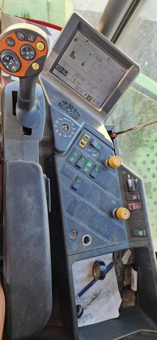 Combina CLAAS Lexion 570 + Heder Paioase 7,5m – 290 kW – An 2010