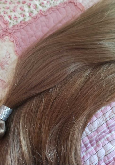 Естествена коса на треса.Дълга 60 см.