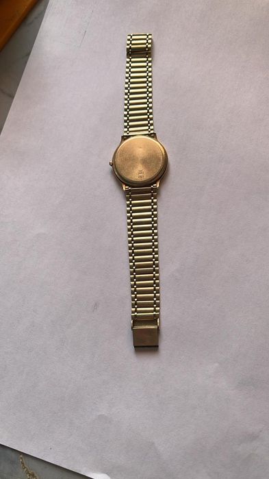 Продам золотые чесы с браслетом