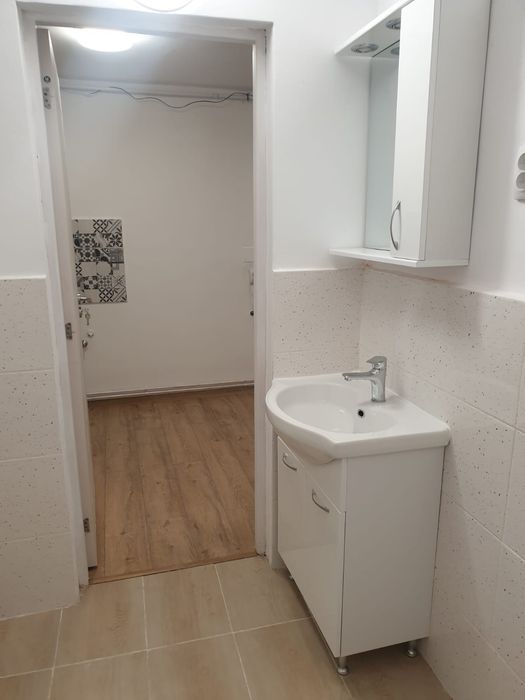 Inchiriez ap. central TgMures, la casă cu curte,zonă f liniștită