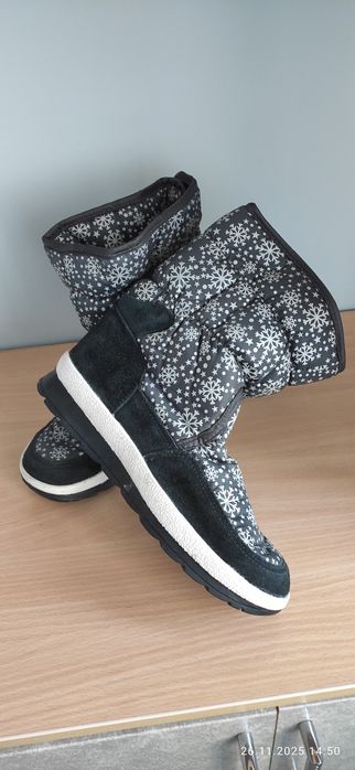 Продам новые сапоги- дутики