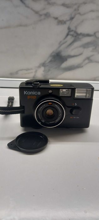 Фотоапарати Polaroid и Konica