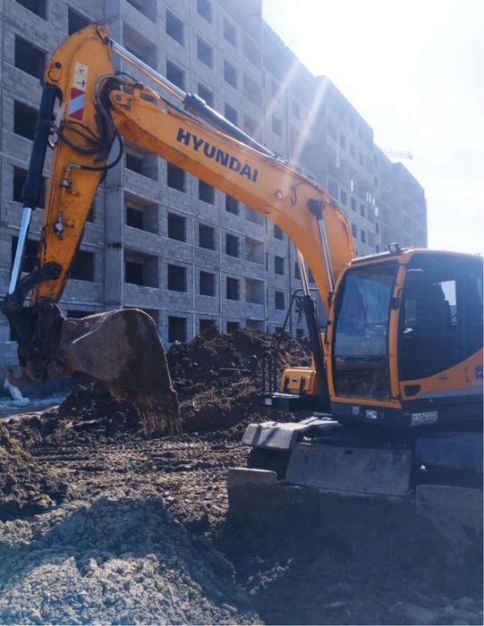 Экскаватор колесный с гидромолотом