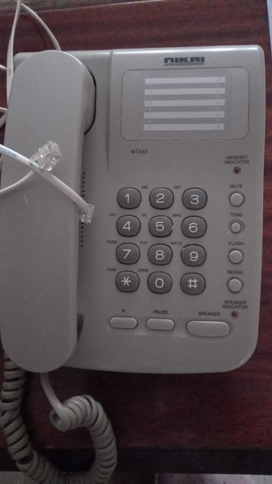 Телефон кнопочный