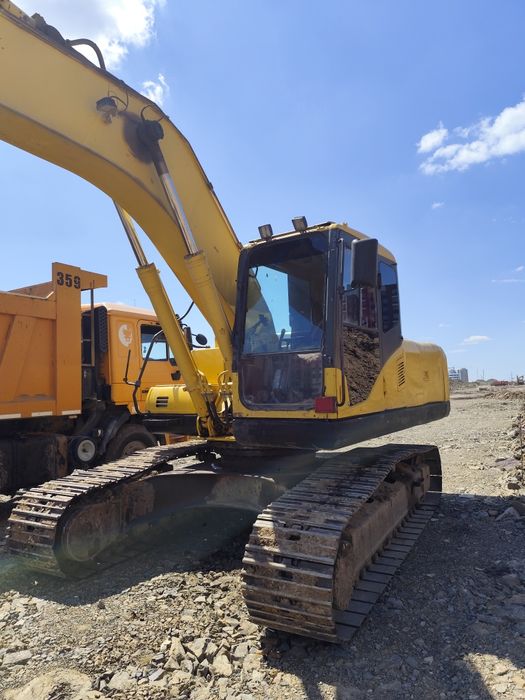 Экскаватор коматсу